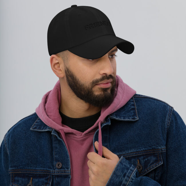 Male model wearing Black Friendly Gear Dad Hat - Black