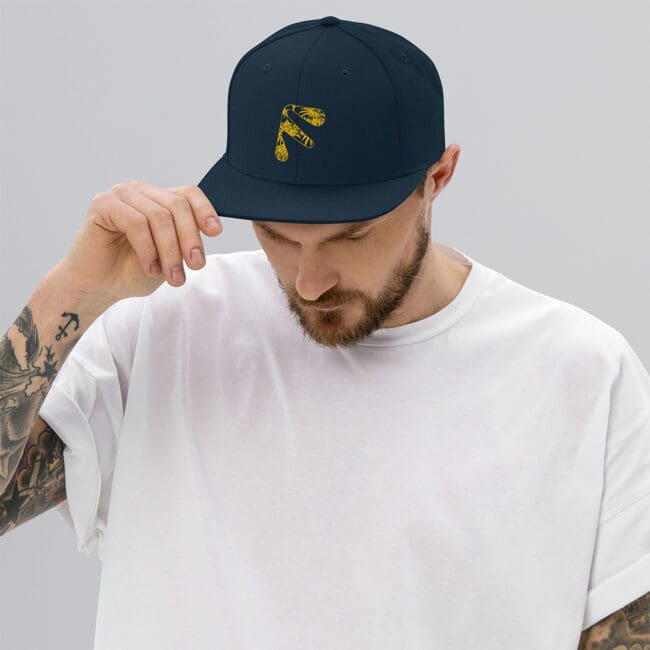 Male model wearing Dark Navy Friendly Gear Snapback Hat - Yellow