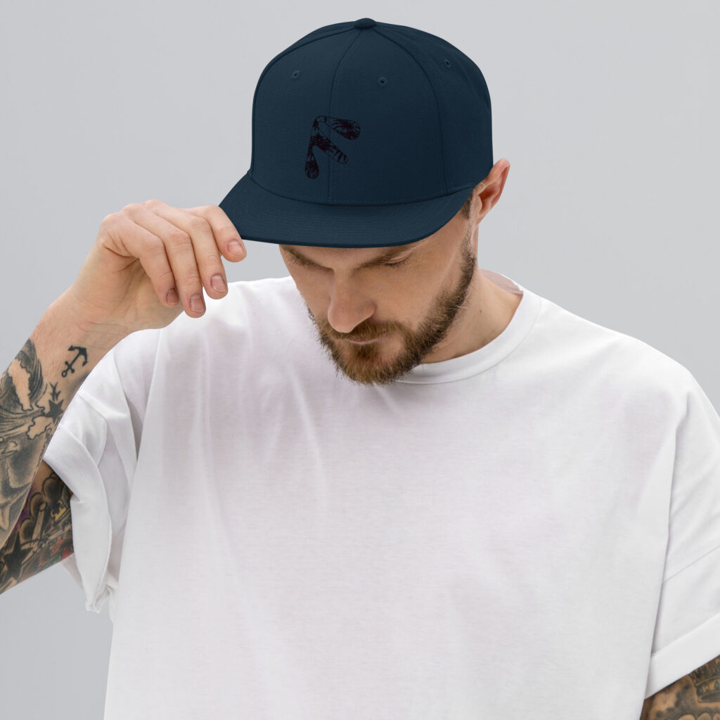 Male model wearing Dark Navy Friendly Gear Snapback Hat - Black