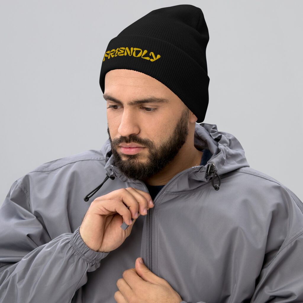 Male model wearing Black Friendly Gear Beanie - Yellow